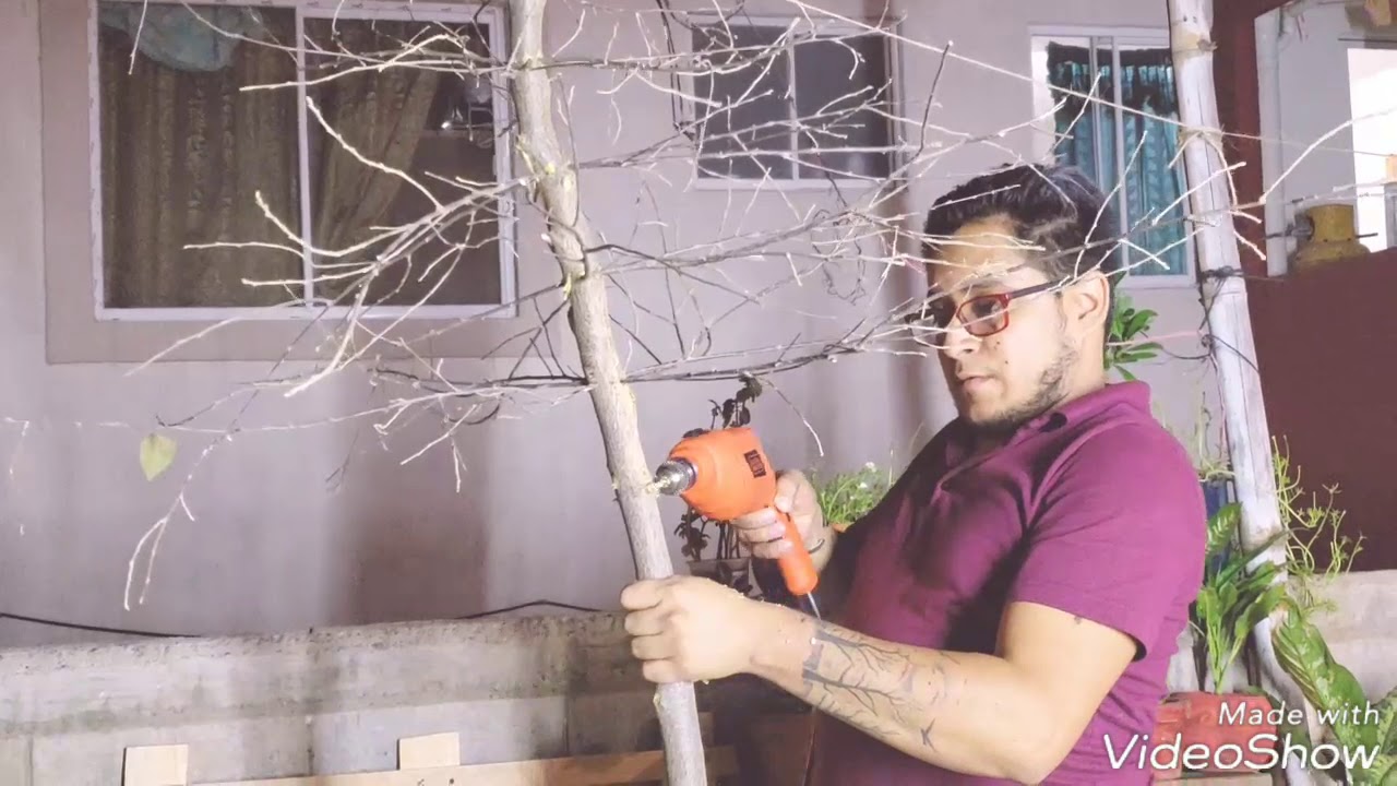 como hacer un arbol de navidad con ramas